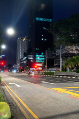 Fototapeta premium Asphalt Road and City Street With Modern Building at Night
