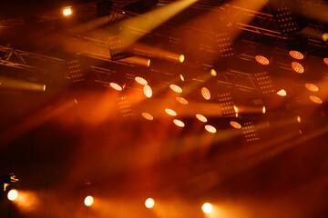 Red-orange color on stage at a concert