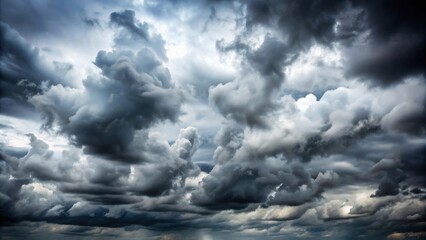 A misty, overcast sky with clouds in various shades of gray, cloudy, overcast, weather, foggy, atmosphere, sky, gray, moody