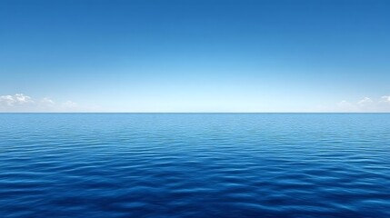 Fototapeta premium A calm blue ocean under a bright blue sky.