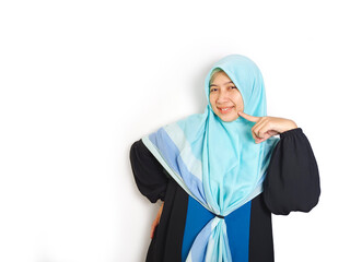 Asian Muslim woman with hijab happy gesture. 