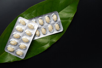 Oil filled blister pack white softgel capsules of food supplements, fish oil, omega 3, vitamin DHA