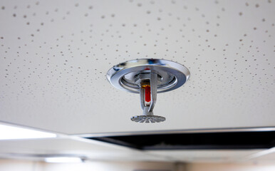Fire sprinkler. Fire sprinkler on the ceiling with vacuum sealed glass tube