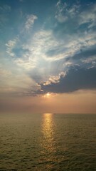 Sunset rays over sea