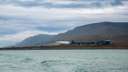 Exploring the coastal landscape of Longyearbyen Svalbard on a cloudy day
