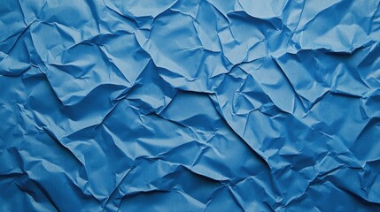 Obraz premium Trendy classic blue textured background featuring crumpled satin paper Flat lay design