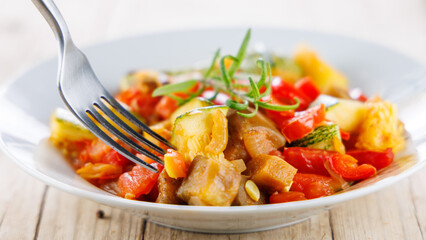 bowl of grilled vegetables with herbs, ratatouille