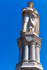 Looking up sculpture of poet named Walther von der Vogelweide at Walther Square at Italian City of Bozen on a sunny summer day. Photo taken July 17th, 2024, Bolzano Bozen, Italy.