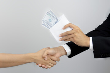 businessman raising his hand to say no for corruption or gratification, forbid, invalid....