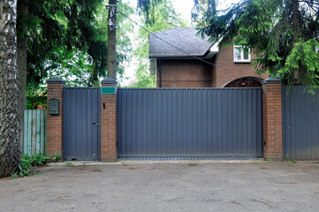 Iron gates of a new beautiful house.