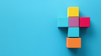 Colorful blocks arranged in creative business concept on vibrant blue background, symbolizing innovation and collaboration