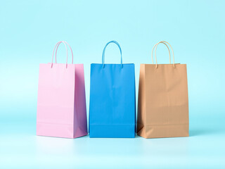 Colorful shopping bags in various sizes isolated on a white background, showcasing their vibrant designs and handles, perfect for retail, gifts, and purchases