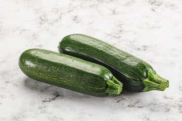 Raw green ripe zucchini vegetable