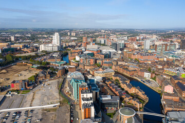 Obraz premium Aerial drone photo of the Leeds city centre showing the main city centre from above on a bright sunny summers day in the West Yorkshire city