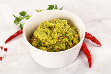 Guacamole with avocado, tomato and chili