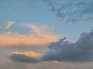 Cloudscape, Colored Clouds at Sunset near the field as a Background