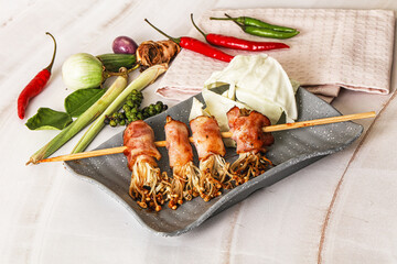Thai Street foof satay with bacon and mushroom
