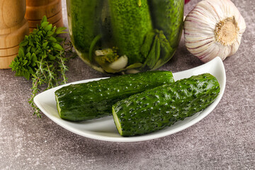 Homemade lighty salted cucumbers with herbs
