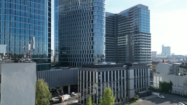 Global Office Park high-rise building in Katowice city at morning - drone flight, 4K view