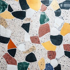 Colorful terrazzo pattern with various shapes and textures, creating a vibrant abstract design.