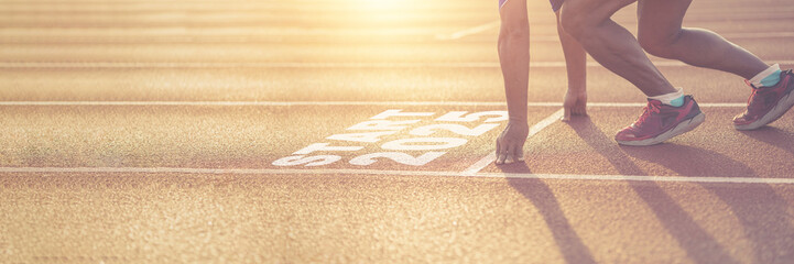 Male runner prepares to run on a treadmill. With text starting the year 2025 in new year start concept. Towards the goal of success	