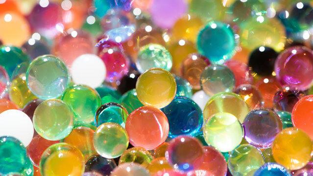different color balls, Water beads close-up,  Texture of Hydrogel balls or many colorful orbeez  background.