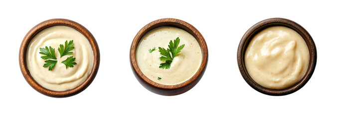 A collection of three wooden bowls filled with creamy mayonnaise garnished with parsley isolated on a transparent background - Powered by Adobe