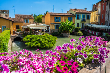 Summer on the Mincio river. Historic village of Borghetto sul Mincio