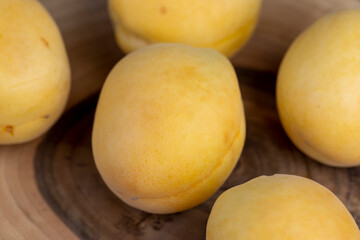 ripe soft apricot fruits on the cutting board
