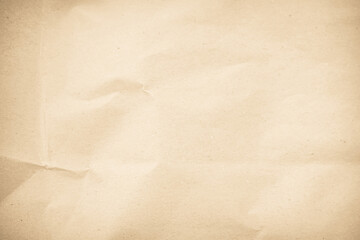 Crumpled brown paper texture background for design with copy space for text or image.