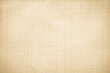 Closeup detail of beige fabric texture background. High resolution photo.