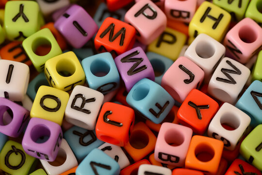 The alphabet in a playful, vibrant array. These letter beads are a testament to the joy of learning.