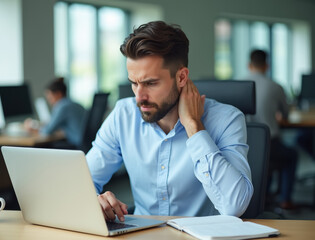 Naklejka premium Contemplative businessman working in an office