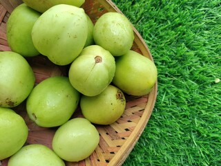 Organic raw tomatoes. Green unripe tomatoes.
