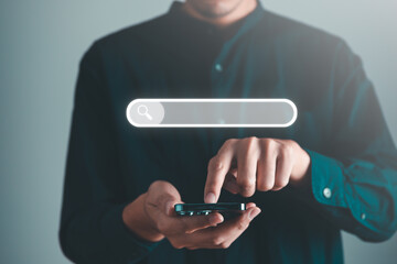 Business man searching information data on internet on toolbar browser. Searching technology and data information concept.