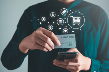 Businessman use laptop for shopping online with cart. shopping online concept.