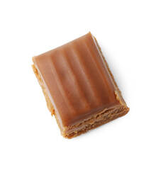 Tasty sweet caramel candy isolated on white, top view