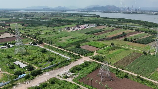 Aerial video of meticulously planned layout of the city would be evident, with wide boulevards, green spaces, and modern infrastructure.