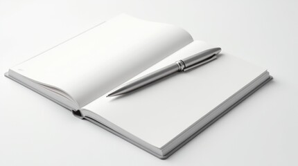 A modern matte metallic pen resting on an open minimalist notebook with crisp white pages.