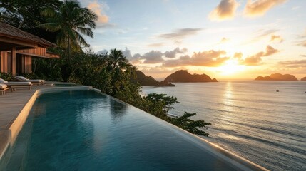 A luxurious infinity pool overlooking a tranquil tropical beach at sunrise, symbolizing indulgence and ultimate relaxation