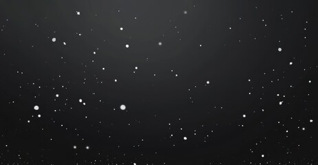 Delicate snowflakes gently falling against a dark background in the tranquil atmosphere of a winter evening