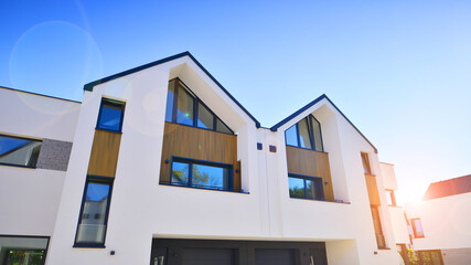 Residential homes with modern facade.Terraced family homes in newly developed housing estate. The...