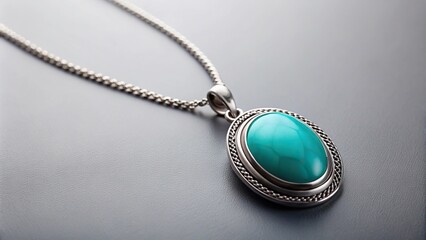 sliver necklace with turquoise pendant on plain background tilted angle