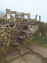 A traditional dry stone wall stepped stile