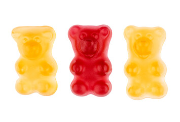 macro of three gummy bears red and yellow isolated on white background