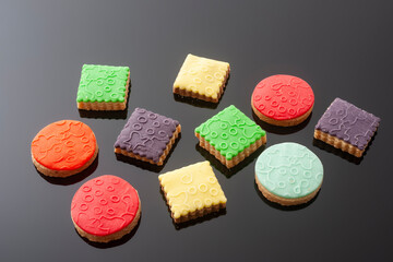 Sweet cookies on a black background.