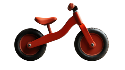 A vibrant red balance bike stands alone against a clean white backdrop, inviting adventure and play