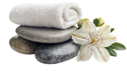 Relaxing spa arrangement with soft towels, smooth stones, and a fresh flower for tranquility