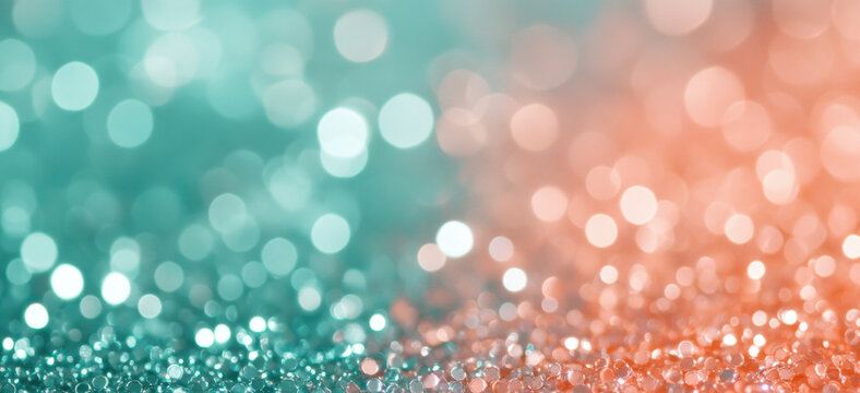 Abstract blur bokeh background. Two colors mint green and peach orange background with glitter and defocused white silver colors bokeh lights