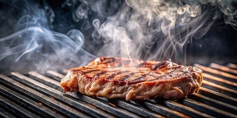 smoky barbecue meat on grill with smoke billowing
